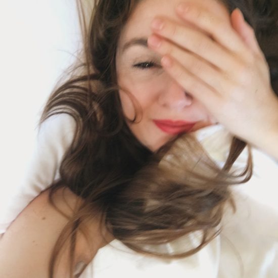 Best time to take a selfie_woman in bed selfie