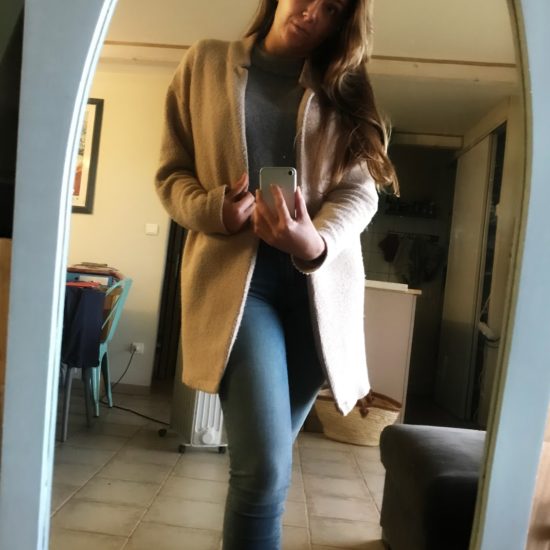 chic standing selfie pose woman indoors